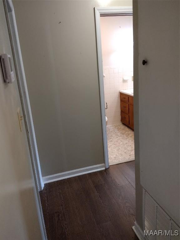 3950 Main St, Millbrook, AL 36054 - corridor with dark wood-type flooring