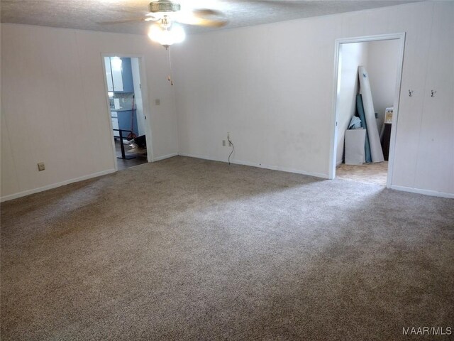3950 Main St, Millbrook, AL 36054 - unfurnished room featuring ceiling fan and carpet
