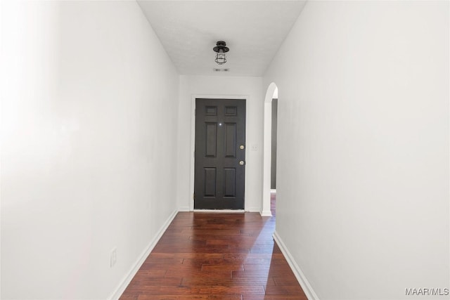1600 Hawthorne Ln, Prattville, AL 36066 - entryway featuring arched walkways, dark wood-style floors, and baseboards