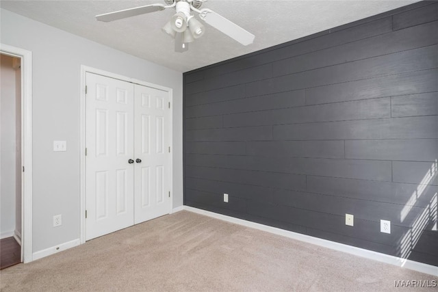 1600 Hawthorne Ln, Prattville, AL 36066 - unfurnished bedroom featuring carpet flooring, a closet, baseboards, and a ceiling fan