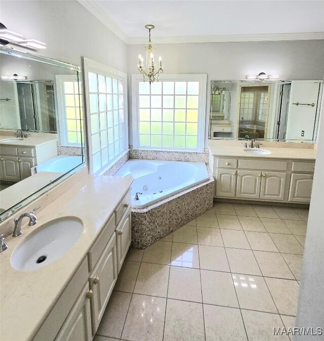 49 Berkeley Rd, Selma, AL 36701 - bathroom featuring tile patterned flooring, ornamental molding, a whirlpool tub, two vanities, and a chandelier