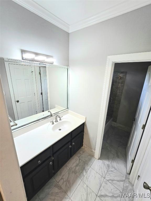 49 Berkeley Rd, Selma, AL 36701 - bathroom featuring marble look tiles, crown molding, vanity, and a shower stall