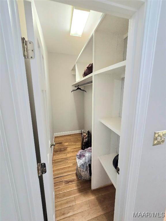 49 Berkeley Rd, Selma, AL 36701 - spacious closet with light wood finished floors