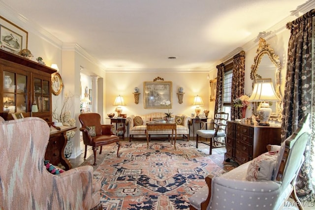 living room featuring ornamental molding and decorative columns
