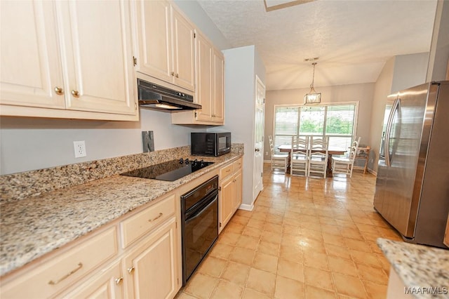 331 Bush Dr, Hope Hull, AL 36043 - kitchen with black appliances, under cabinet range hood, baseboards, pendant lighting, and light stone counters