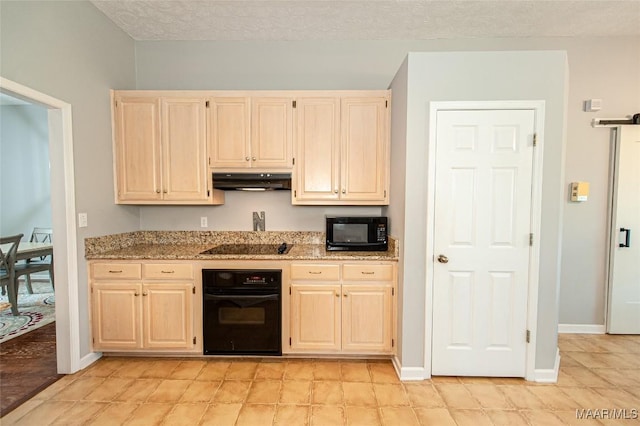331 Bush Dr, Hope Hull, AL 36043 - kitchen featuring black appliances, light brown cabinetry, under cabinet range hood, light stone countertops, and baseboards