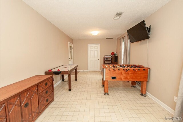 331 Bush Dr, Hope Hull, AL 36043 - playroom with baseboards and a textured ceiling