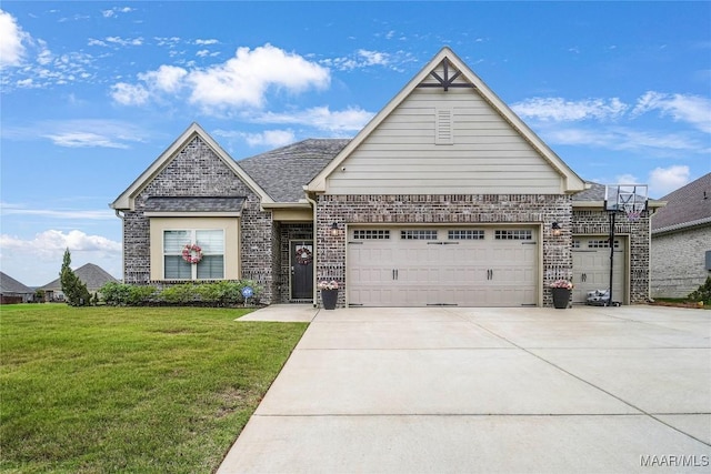 1412 Wildlife Way, Prattville, AL 36066 - view of front of house featuring a garage, a front lawn, concrete driveway, and brick siding
