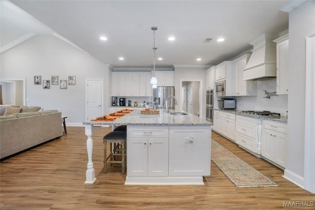 1412 Wildlife Way, Prattville, AL 36066 - kitchen with premium range hood, appliances with stainless steel finishes, a sink, white cabinets, and recessed lighting