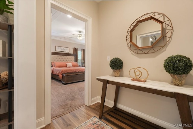 1412 Wildlife Way, Prattville, AL 36066 - hallway with wood finished floors, baseboards, and ornamental molding