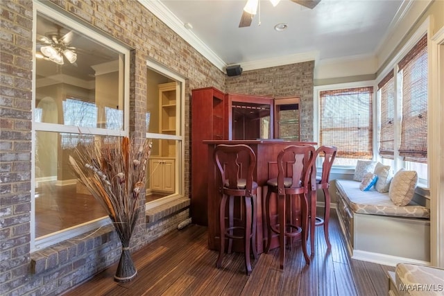 5906 Amberwood Ln, Montgomery, AL 36116 - indoor dry bar featuring a ceiling fan, hardwood / wood-style flooring, healthy amount of natural light, and ornamental molding