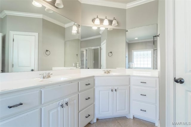 5906 Amberwood Ln, Montgomery, AL 36116 - bathroom featuring ornamental molding, double vanity, and tile patterned flooring