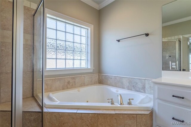 5906 Amberwood Ln, Montgomery, AL 36116 - bathroom with crown molding, a jetted tub, vanity, and a shower stall