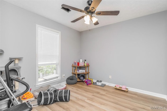1274 Cross Creek Rd, Prattville, AL 36067 - playroom with wood finished floors, ceiling fan, baseboards, and a textured ceiling