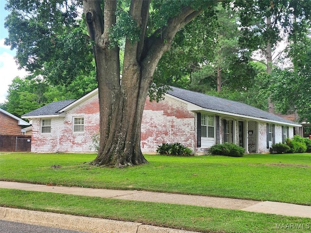 305 Sterling Dr, Montgomery, AL 36109 - view of side of home with brick siding, a yard, and a chimney