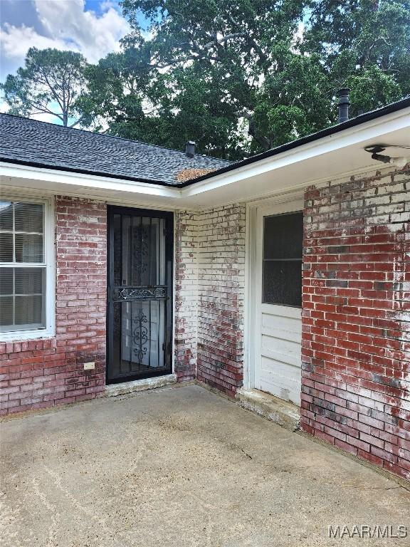 305 Sterling Dr, Montgomery, AL 36109 - doorway to property with brick siding