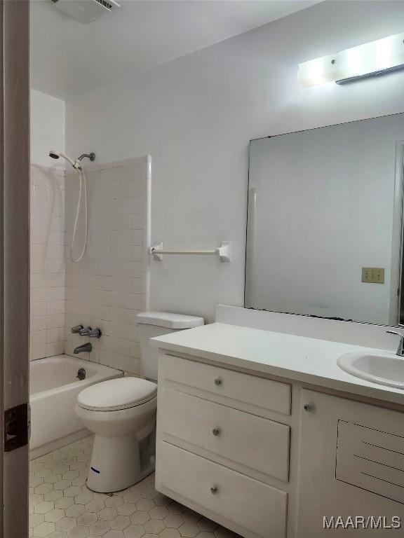 305 Sterling Dr, Montgomery, AL 36109 - bathroom with tile patterned flooring, toilet, vanity, and tub / shower combination