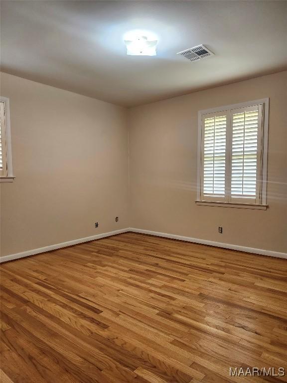 305 Sterling Dr, Montgomery, AL 36109 - unfurnished room with baseboards and wood finished floors
