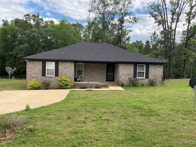 215 Indian Ln, Tallassee, AL 36078 - ranch-style house featuring brick siding, a front yard, and a shingled roof