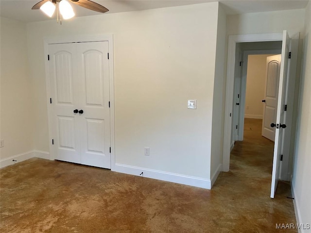 215 Indian Ln, Tallassee, AL 36078 - unfurnished bedroom with a closet, baseboards, and ceiling fan
