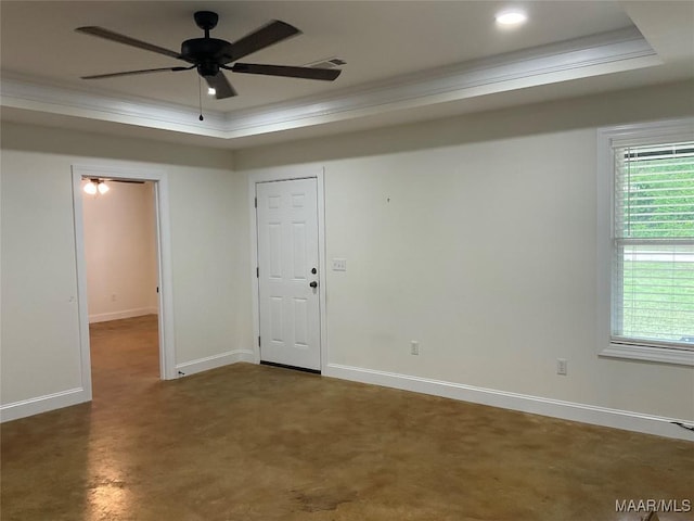 215 Indian Ln, Tallassee, AL 36078 - spare room with ornamental molding, a raised ceiling, ceiling fan, plenty of natural light, and baseboards