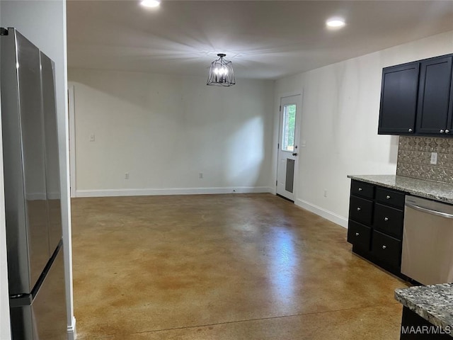 215 Indian Ln, Tallassee, AL 36078 - unfurnished dining area with concrete flooring, baseboards, and recessed lighting