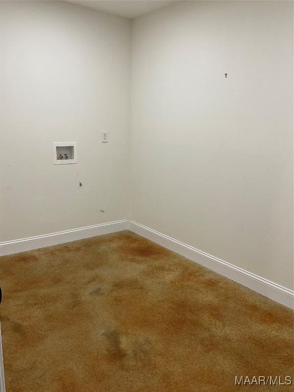 215 Indian Ln, Tallassee, AL 36078 - carpeted spare room with baseboards
