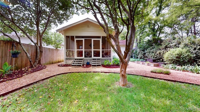 1207 Woodward Ave, Montgomery, AL 36106 - rear view of house with a sunroom