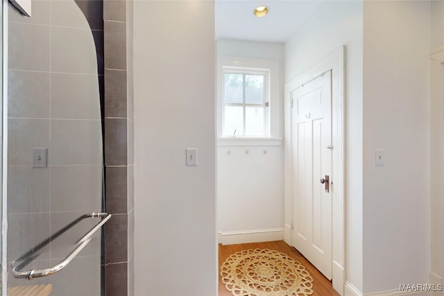 1207 Woodward Ave, Montgomery, AL 36106 - interior space with wood finished floors, baseboards, and a tile shower