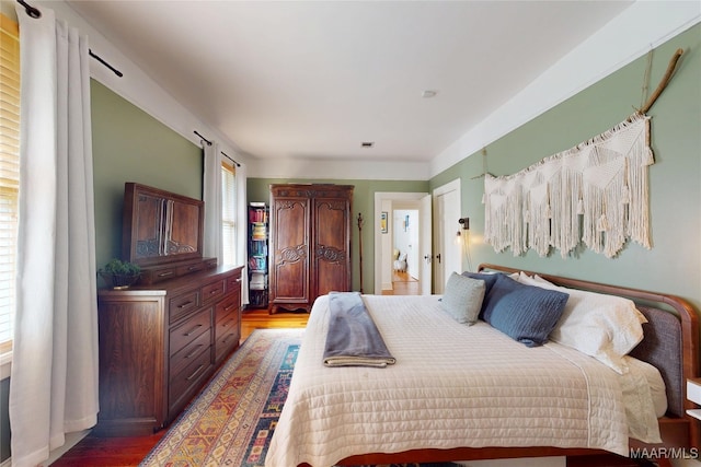 1207 Woodward Ave, Montgomery, AL 36106 - bedroom featuring wood finished floors