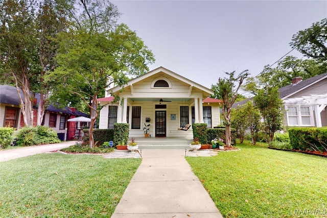 1207 Woodward Ave, Montgomery, AL 36106 - view of front of home with a porch and a front yard