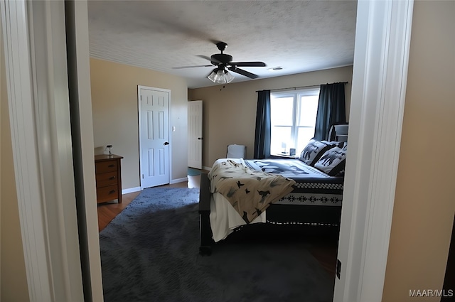 1496 County Road 81st Rd, Prattville, AL 36067 - bedroom with ceiling fan, a textured ceiling, and baseboards