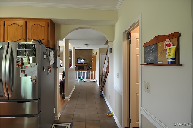 1496 County Road 81st Rd, Prattville, AL 36067 - hall featuring arched walkways, dark tile patterned flooring, baseboards, and ornamental molding