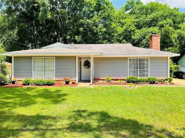 452 Planters Rd, Montgomery, AL 36109 - ranch-style home with a chimney and a front lawn