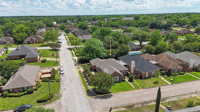 aerial view of residential area with property boundaries highlighted