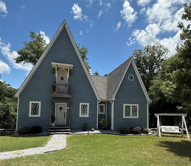 103 Thomas Ct, Prattville, AL 36067 - view of front facade featuring a balcony, a front lawn, and roof with shingles