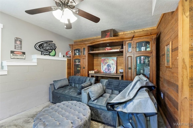 103 Thomas Ct, Prattville, AL 36067 - living room with wood walls and ceiling fan