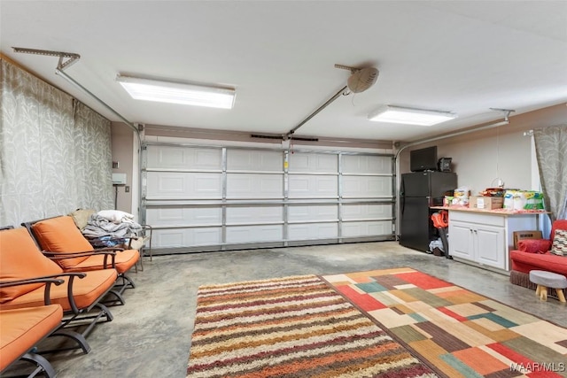 103 Thomas Ct, Prattville, AL 36067 - garage with freestanding refrigerator