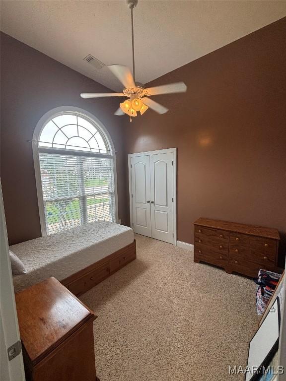 109 Coleman Dr, Prattville, AL 36067 - bedroom with light carpet, a ceiling fan, high vaulted ceiling, and baseboards
