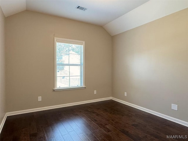 9145 Autumn Brooke Way, Montgomery, AL 36117 - empty room with vaulted ceiling and dark wood-style floors