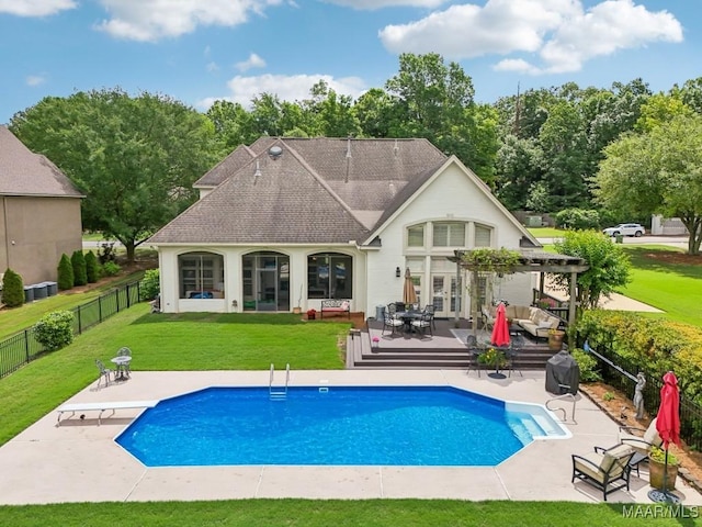 rear view of house featuring a pergola, a deck, roof with shingles, and a patio area