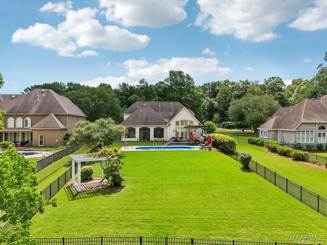 back of house featuring a patio and view of scattered trees