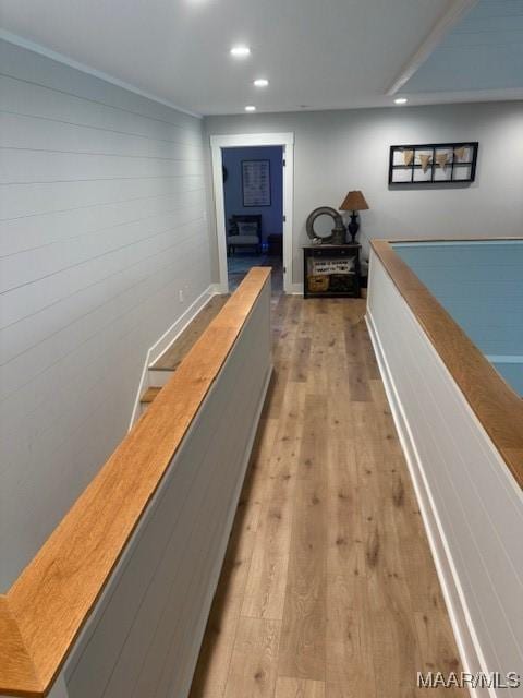 hall with hardwood / wood-style floors and recessed lighting