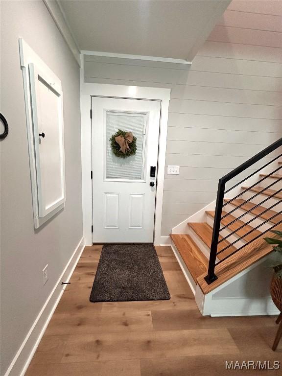 2533 Weldon Rd, Tallassee, AL 36078 - foyer entrance with wood finished floors and stairway