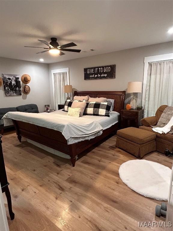 2533 Weldon Rd, Tallassee, AL 36078 - bedroom with wood finished floors, a ceiling fan, and recessed lighting