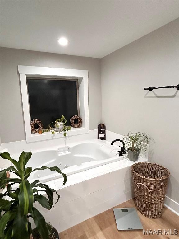 2533 Weldon Rd, Tallassee, AL 36078 - full bath with a jetted tub, wood finished floors, and recessed lighting
