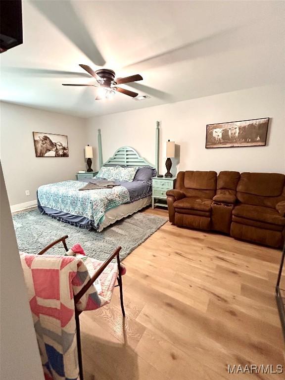 2533 Weldon Rd, Tallassee, AL 36078 - bedroom featuring wood finished floors and a ceiling fan