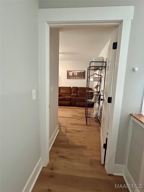 2533 Weldon Rd, Tallassee, AL 36078 - corridor featuring light wood-type flooring and baseboards