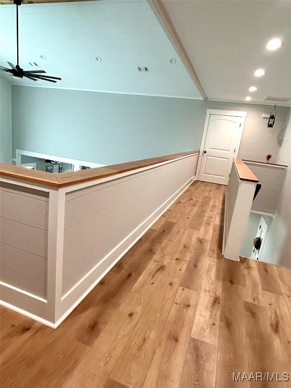 2533 Weldon Rd, Tallassee, AL 36078 - corridor with light wood-type flooring, recessed lighting, and an upstairs landing