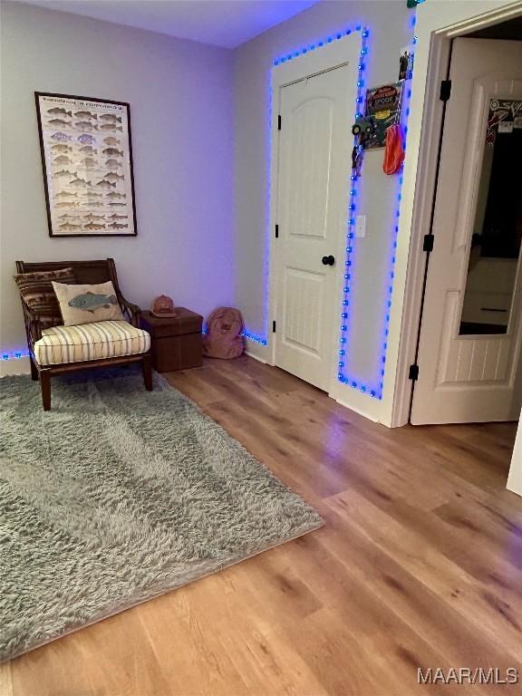 2533 Weldon Rd, Tallassee, AL 36078 - sitting room with wood finished floors and baseboards
